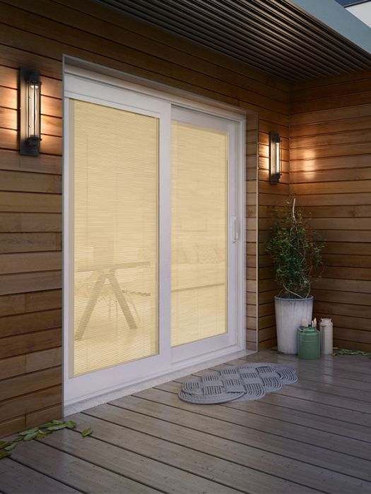 Sliding patio door opening onto a bright living space